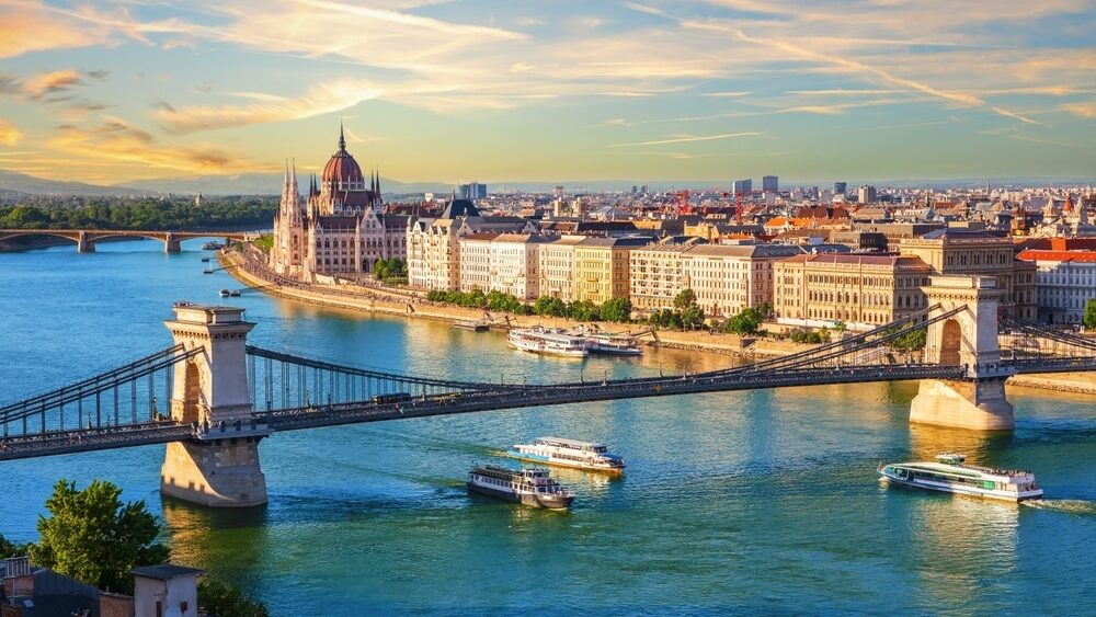 Famous Szechenyi Chain Bridge, symbol of Budapest, Hungary, summer sunset view