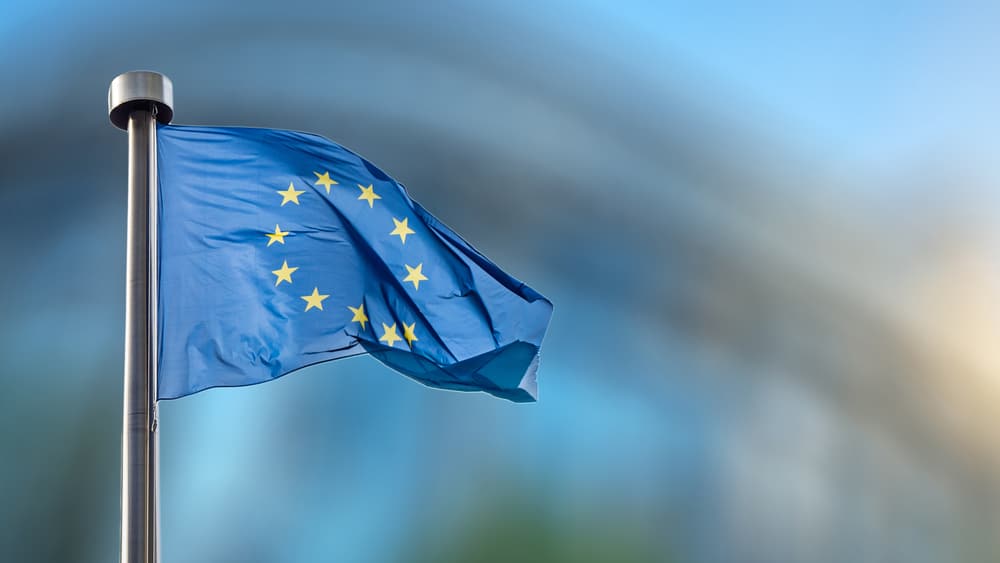 European Union flag in front of the Berlaymont building (European commission) in Brussels, Belgium.